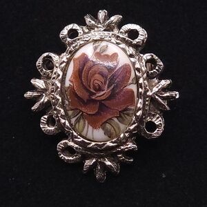 vintage pendant/brooch with a porcelain rose cameo